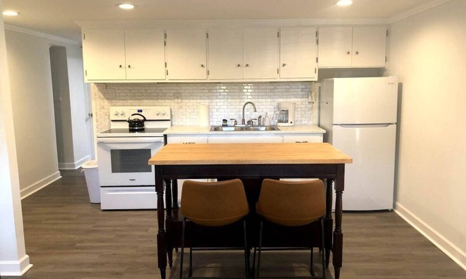 Hickory Apartment | Bright open studio apartment with king bed and queen sofabed. Walk to local shops and restaurants.