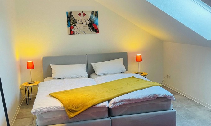 Karthause Condo | Bright, spacious attic apartment.