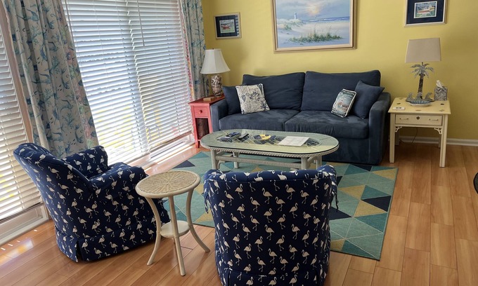 Emerald Isle Condo | Bright, sunny, beautifully decorated one-bedroom condo overlooking the pool.