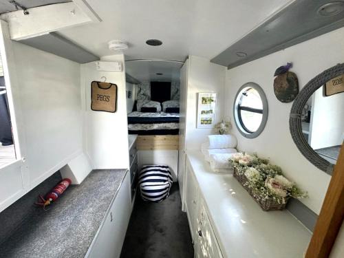 Runnymede Boat Rental | BrightOwl Waterside Narrowboat Cottage Experience
