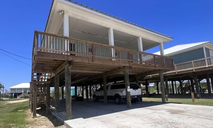 Grand Isle House | Broussard's Duplex B: Cozy 2BR getaway across from the beach in Grand Isle, LA.