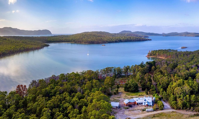 South Bruny Cabin | Bruny Island Lodge - Set amongst 860 acres of pristine bushland in remote South Bruny is The Lodge, a rustic timber chalet on the hill above Oyster Cove on Mickey’s Bay. The Lodge offers a unique experience on Bruny Island; it combines spectacular n
