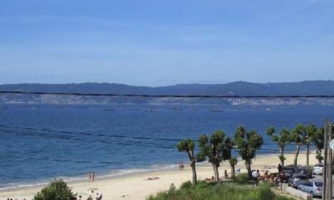 Bueu Apartment | Bueu: Bueu, Rias Baixas, apartment with views in front of Agrelo beach
