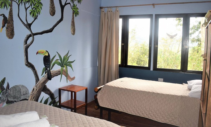 Turrialba House | bungalow surrounded by wildlife, gardens, waterfalls and trails.