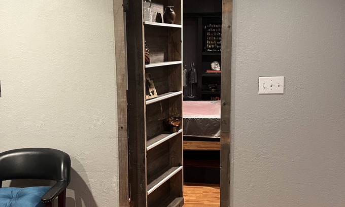 Spokane House | Bungalow with hidden room behind bookcase door and no cleaning fees