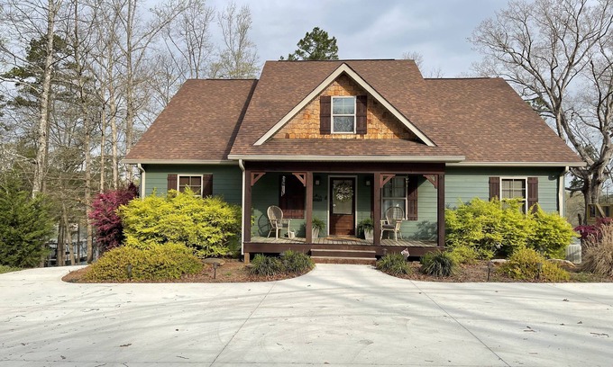 Hartwell House | By the Lake Lodge. 4 Bedroom/4 Bath.Enjoy fun on the lake.