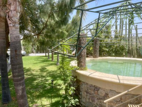 Tequisquiapan House | Cabaña Magnolias con albercajacuzzi