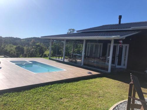 Rancho Queimado House | Cabana Guimarães