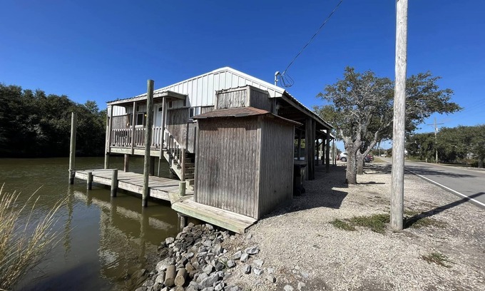 Hopedale Cabin | Cajun Saint Outdoors - Cozy Camp Over The Water