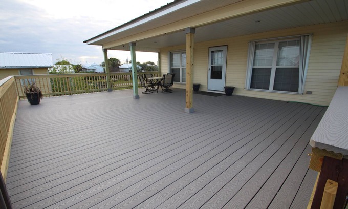 Grand Isle House | Cajun Yacht Club: Spacious 4BR camp in Grand Isle, LA, across from the beach.