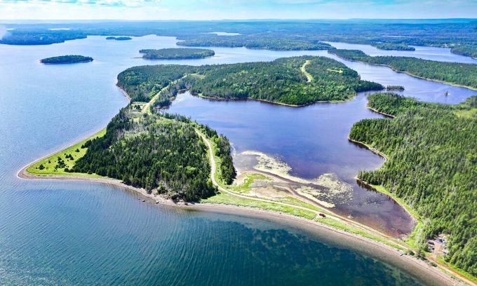 River Bourgeois House | Camper's Nest secluded on a protected canoe bay only 12 min distant to St.Peters