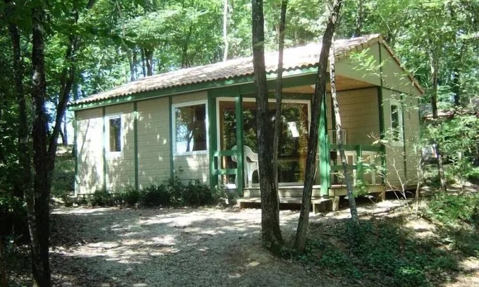 Castelnau-de-Montmiral House | Camping du Chêne Vert * - Bungalow Comfort 5pers 38,50m2 with covered terrace 2 bedrooms shaded and half shaded 5 people