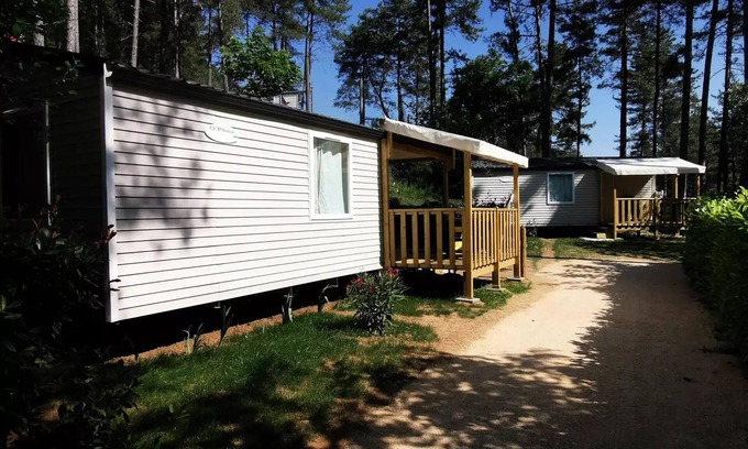 Ucel House | Camping Ushuaïa Villages les Pins d'Ucel * - HIRONDELLE - mobile home 28 m² + TV for 5 to 6 people - 5 people. included in the price