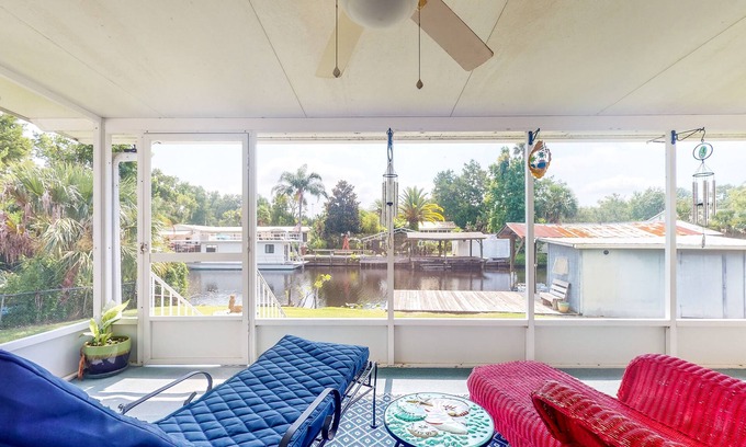 Astor House | Canal-Front Home with Private Covered Boat Dock & Waterfront Screened Porch