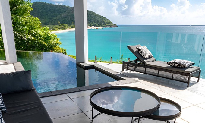Fryes Beach Hotel | Caribbean Bliss Awaits in This Luxurious Beachside Villa with Dining Area