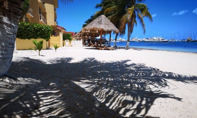Puerto Juarez Condo | Caribbean sea is waiting for you at a discount with condo on the beach & pools