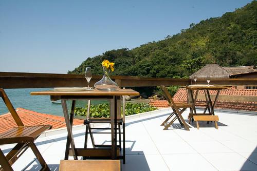 Trindade House | Casa 1 - Você a Varanda e o Mar na Praia dos Ranchos-Trindade Hospeda