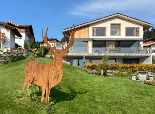 Flims Apartment | Casa Admisa, spektakuläre Aussicht, Ski in and out, hochwertige Einrichtung, Valserstein und Eiche