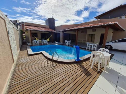 Capim Macio House | Casa agradável: piscina, churrasqueira e redário.