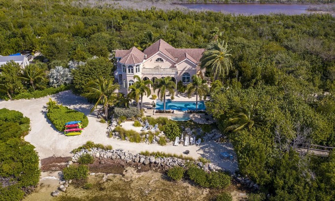 Cudjoe Key House | CASA AQUA - 16 Acre Open Water Spanish Style Casual Elegance