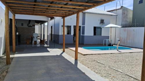 Prado House | Casa com piscina e espaço gourmet a 30m da praia!