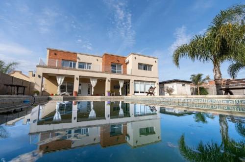 Roldan House | Casa con pileta