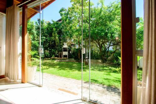 Santinho House | Casa Container perto da Praia TJ3949