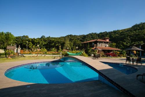 Antonio Carlos House | Casa da Família no Sítio Mannes