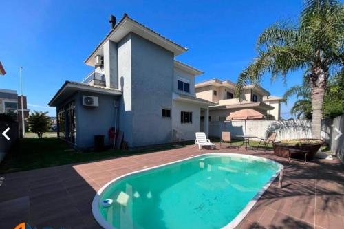 Muquem House | Casa de praia para familia nos Ingleses