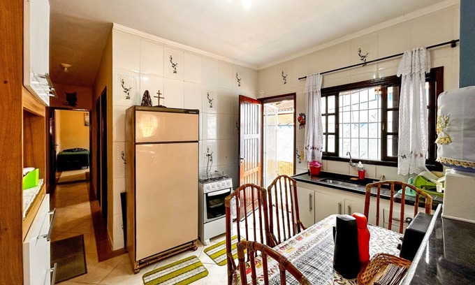 Indaia House | Casa em Bertioga/ Jardim Indaiá