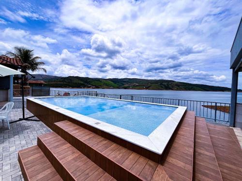 Capitolio House | Casa em Capitólio com piscina e vista para lago | W1