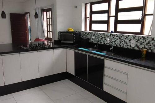 Real House | Casa em Praia Grande Litoral sul
