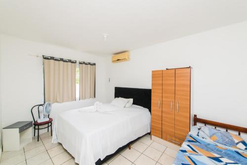 Palhoca House | Casa Espaçosa com quintal interno