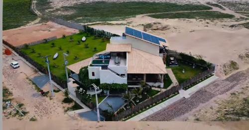 Coqueiro House | Casa farol do itaqui