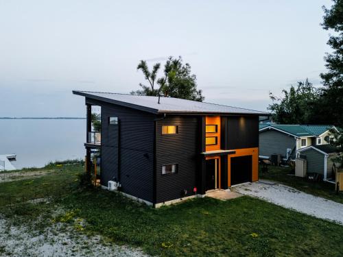 Severn House | Casa Luna Chic Lakehouse BBQ Game Room LakeViews