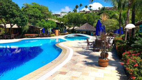 Arraial d'Ajuda House | Casa na Praia de Mucugê - Arraial D'ajuda - Bahia - 40m da praia - Ar condicionado - vaga de estacionamento - Wifi