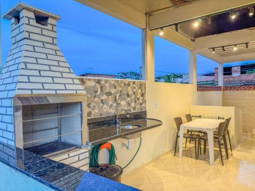 Mambucaba House | Casa na prainha de Mambucaba. Uma quadra do mar.