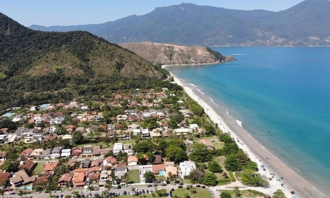 Guaeca House | CASA NOVA - 60 m from the beach with air conditioning, barbecue on the terrace and garden