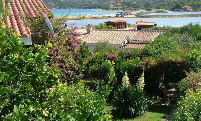 Porto Taverna House | Casa Oleandro, gardened apartment, 100 meters walk to the beach, internet Wi-Fi