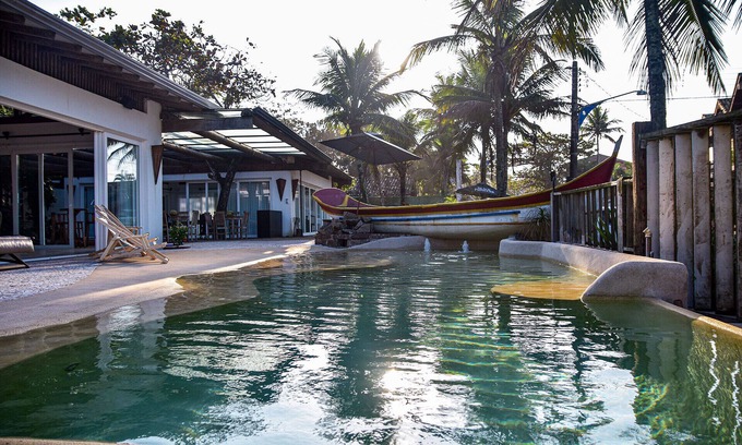 Tombo House | Casa pé na areia da Praia do Tombo, no Guarujá/SP