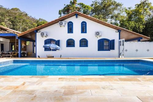 Caraguatatuba Apartment | CASA PARATY · linda piscina, bilhar, campo de futebol, em condomínio