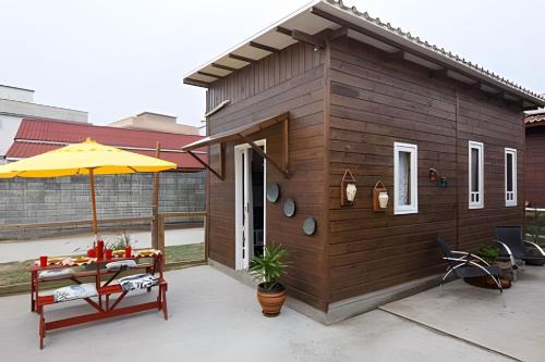 Muquem Ski Chalet | Casa Perto das melhores praias Florianópolis, 8 pessoas, ar condicionado, tv, wifi, cozinha completa, lavanderia,