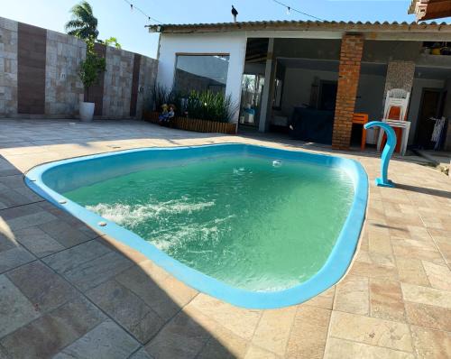 Palhoca House | Casa próximo à praia com piscina , hospeda até 20 pessoas