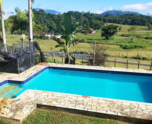 Pomerode House | Casa Suíça família-luxo nr4 Suite master 5-pessoas