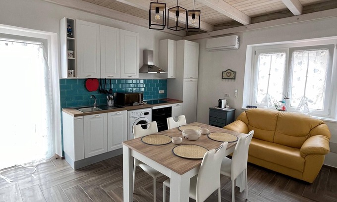 Carbonia Apartment | Casa Vacanze Iris - Three Bedroom Apartment, Sleeps 6