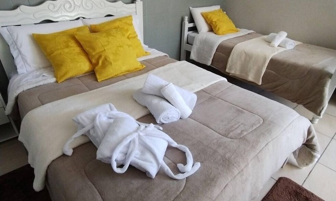 Praia Grande House | Casinha do turista c boa localização-Praia Grande