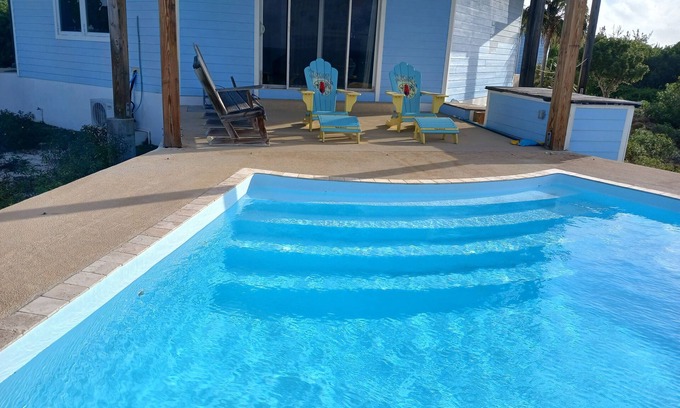 Port Howe House | Cat Island Paradise . Overlooking turquoise waters and sky, sunrise and sunset.