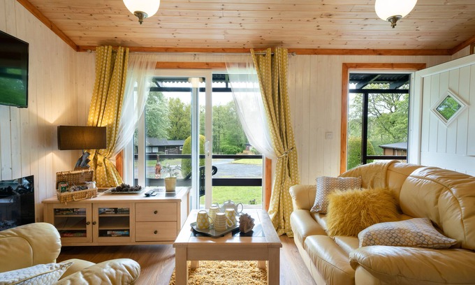 Cenarth Ski Chalet | Catkin Lodge set in a Beautiful 24 acre Woodland Holiday Park