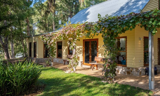 Wandiligong House | Centenary Heights - Boasting commanding views of the surrounding bushland and rolling hills of Wandiligong .