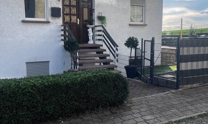 Hutschenhausen Apartment | Centrally located top floor apartment with pool view, air conditioning and fitness equipment